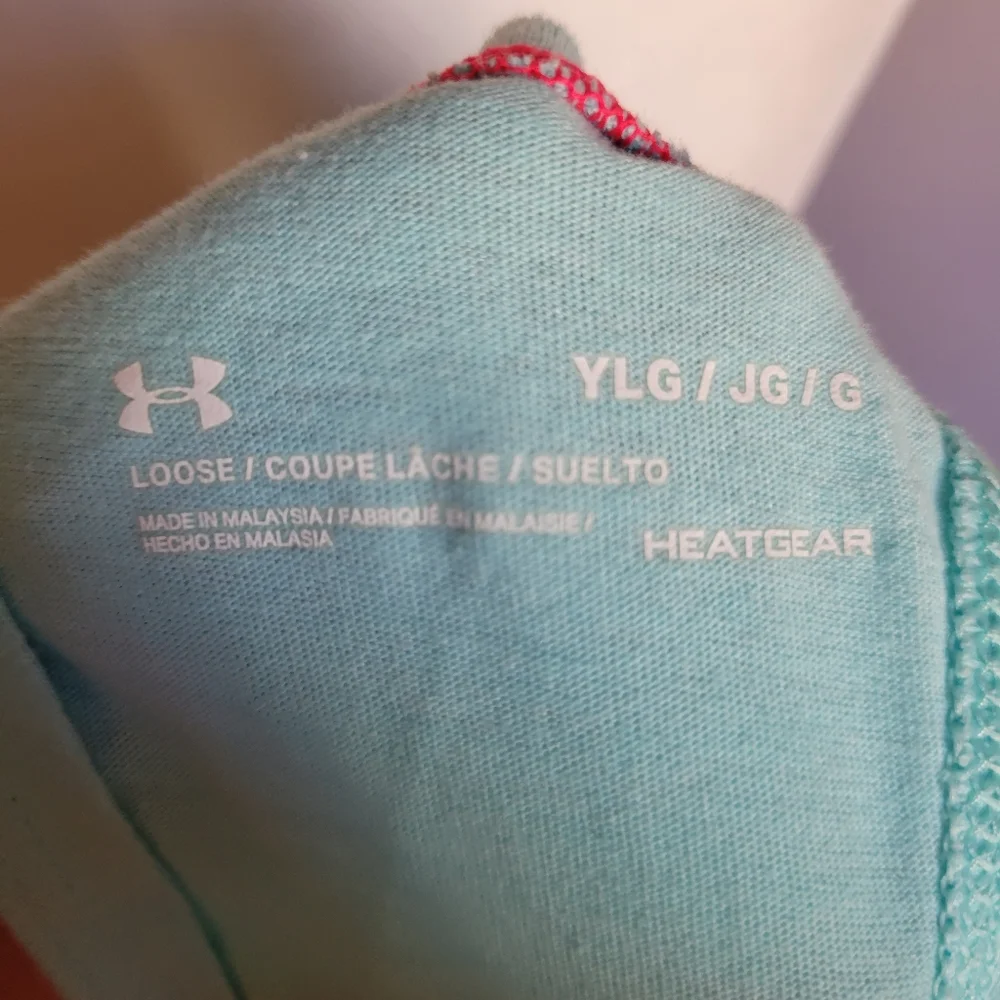 Under Armour youth Large blue cross back‎ tank top